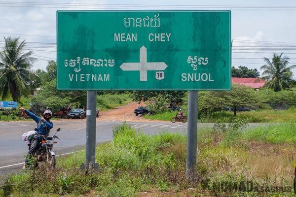 Cambodia Motorcycle Adventure Vietnam Border Sign