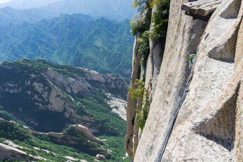 Staring over the border on the Mount Huashan hike Surviving The World’s Most Dangerous Hike – Mt Huashan