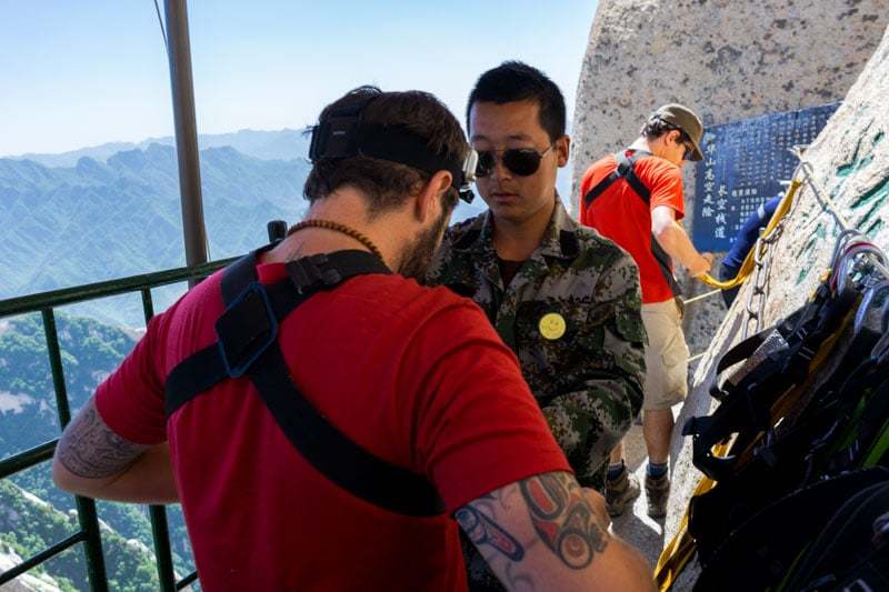 Staring over the border on the Mount Huashan hike Surviving The World’s Most Dangerous Hike – Mt Huashan