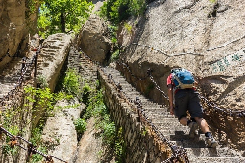 Staring over the border on the Mount Huashan hike Surviving The World’s Most Dangerous Hike – Mt Huashan