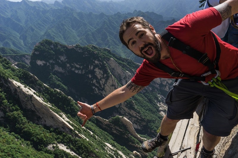 Staring over the border on the Mount Huashan hike Surviving The World’s Most Dangerous Hike – Mt Huashan