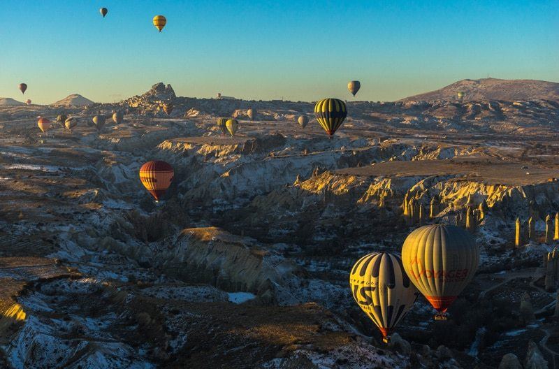 Floating on a gentle breeze high higher upwards the fairy chimneys Flying High In H5N1 Hot Air Balloon In Cappadocia