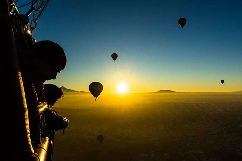 Floating on a gentle breeze high higher upwards the fairy chimneys Flying High In H5N1 Hot Air Balloon In Cappadocia