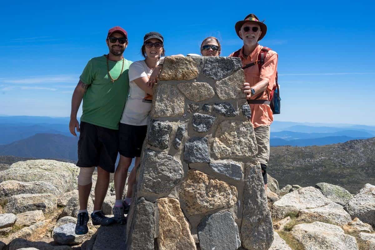 Group On The Summit Climbing Mount Kosciuszko