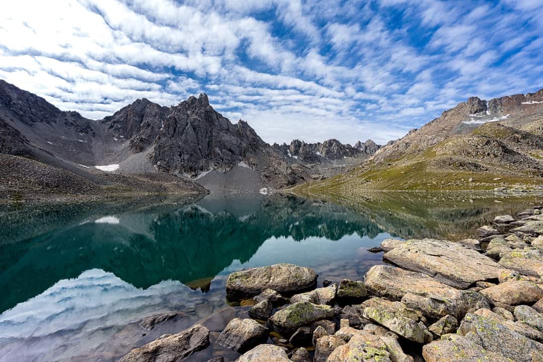 Photos Of Kyrgyzstan Reflective Lake Feature Jyrgalan Trek Kyrgyzstan