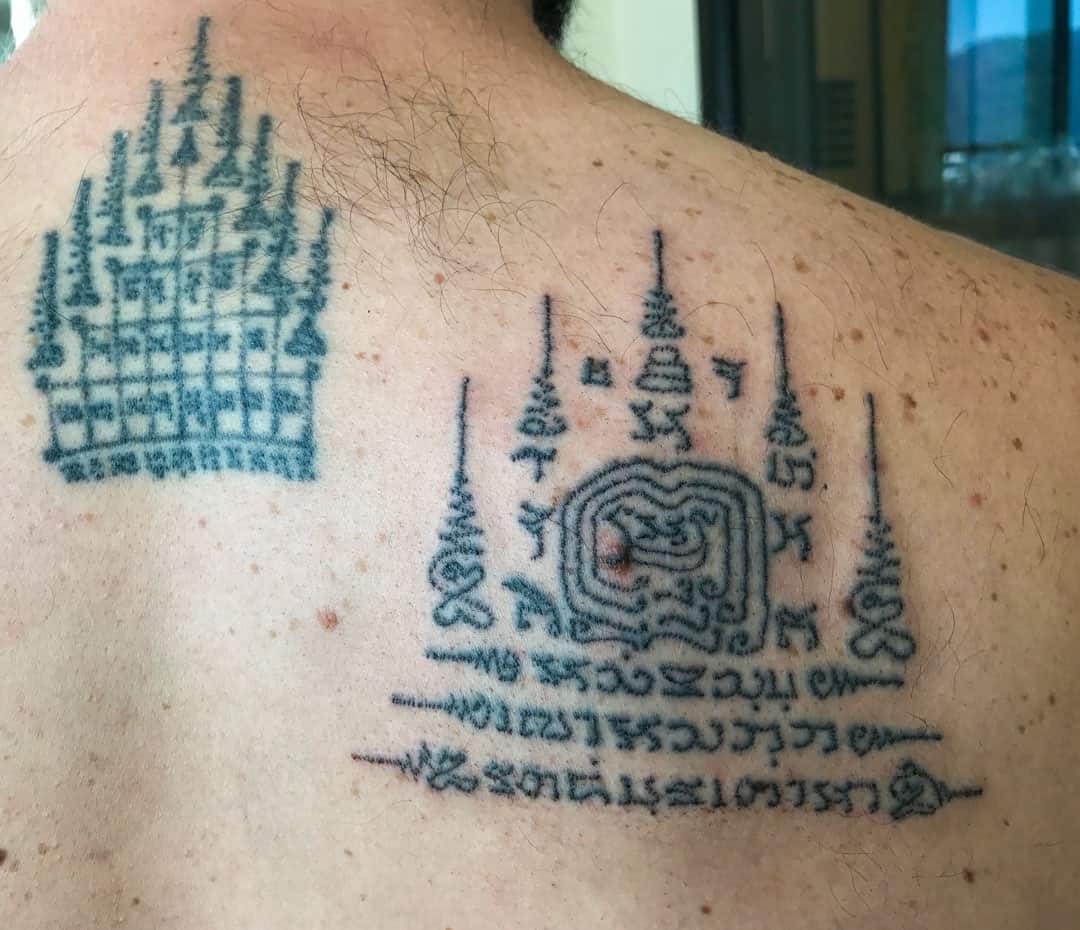 Had my 1st large tattoo done: Thai good luck done with bamboo: no blood and  quick healing : r/tattoo