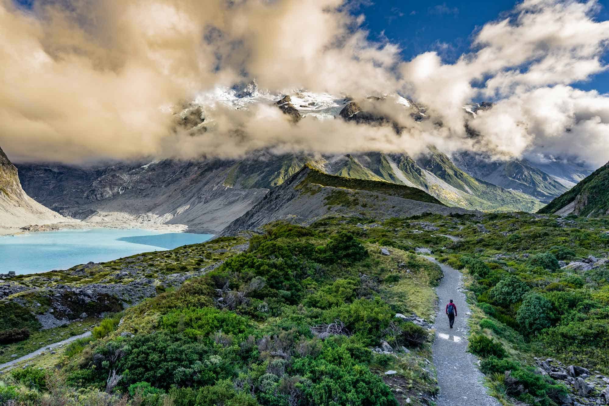 waterfall valley new zealand steep torrent group mountain blue