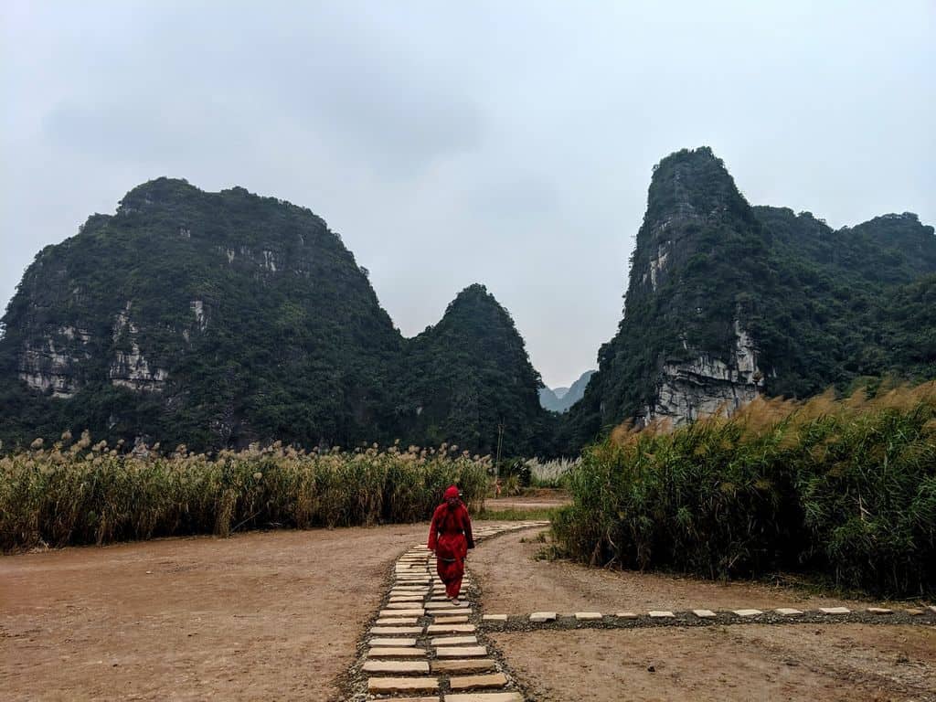 Huge Limestone Cliffs Dominate The Landscape In Ninh Binh