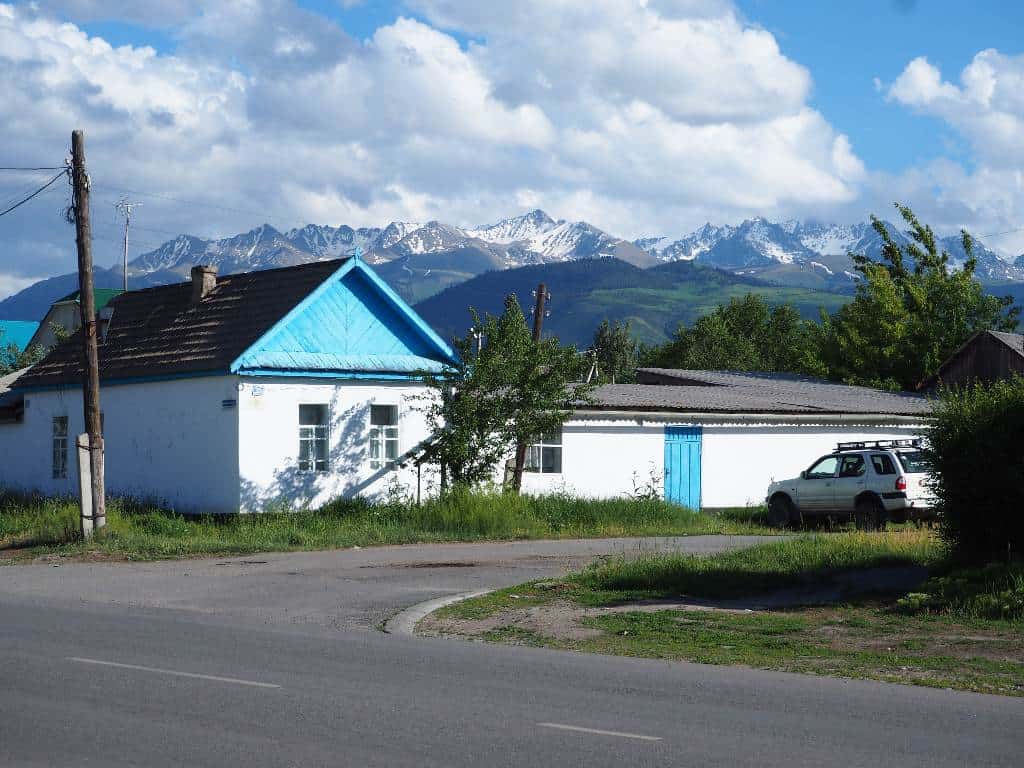 A House In Karakol Mountains Behind