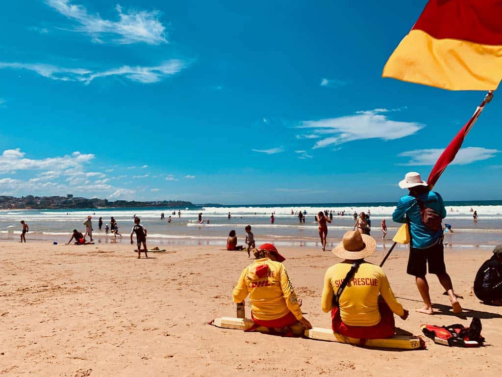 Sea Rescue Staff Looking At Water