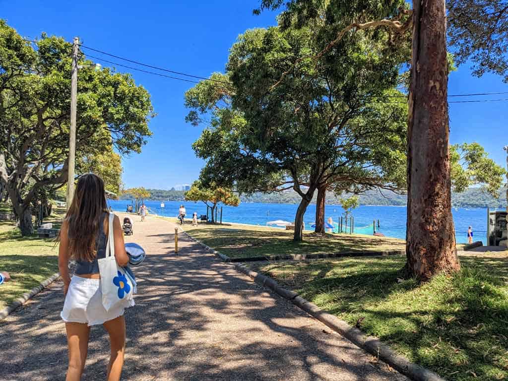 Girl Walking On Shark Beach