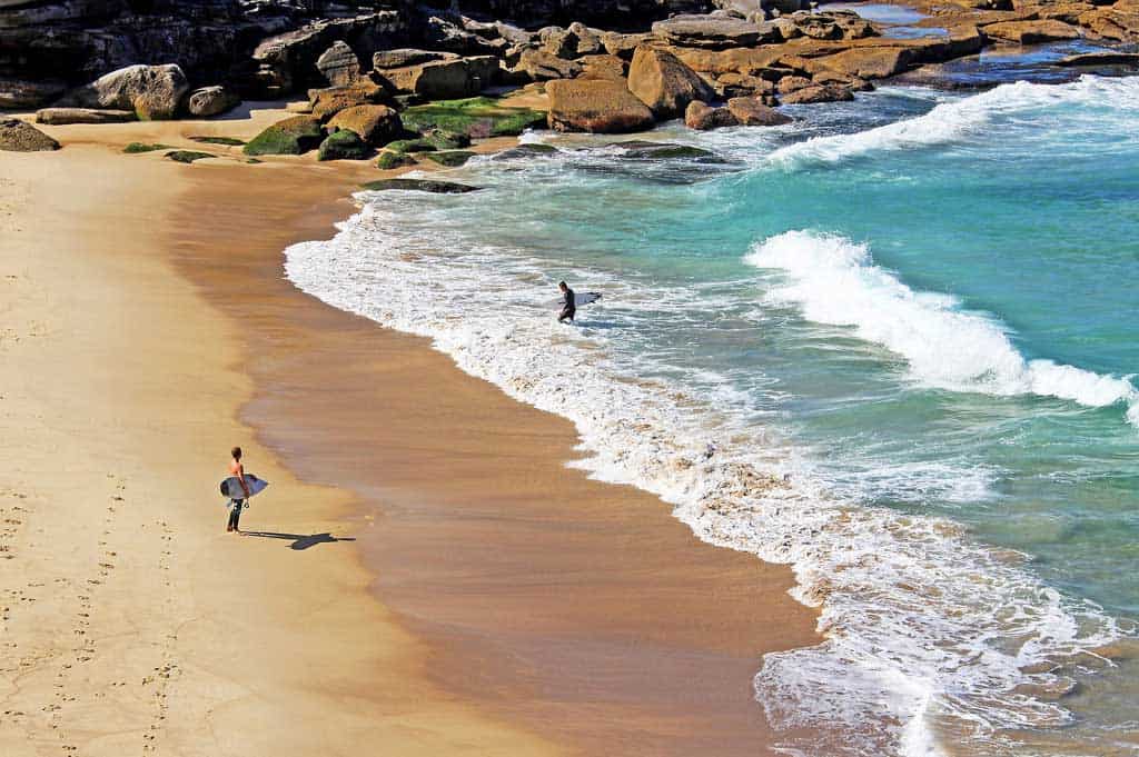 Surfers At The Beach