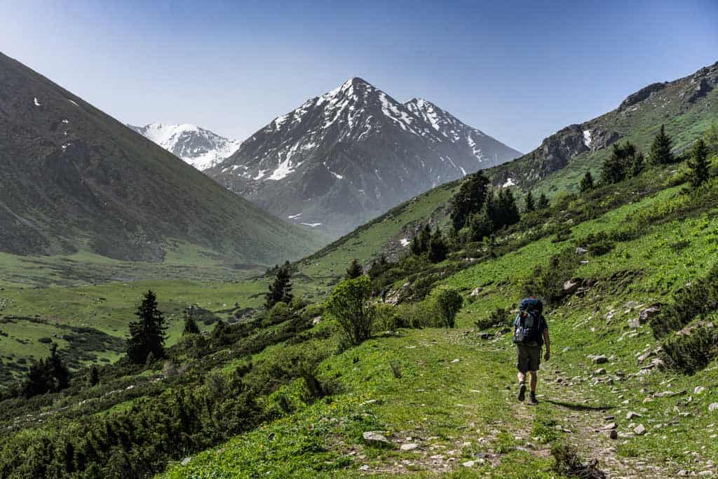 Person Hiking In Mountains