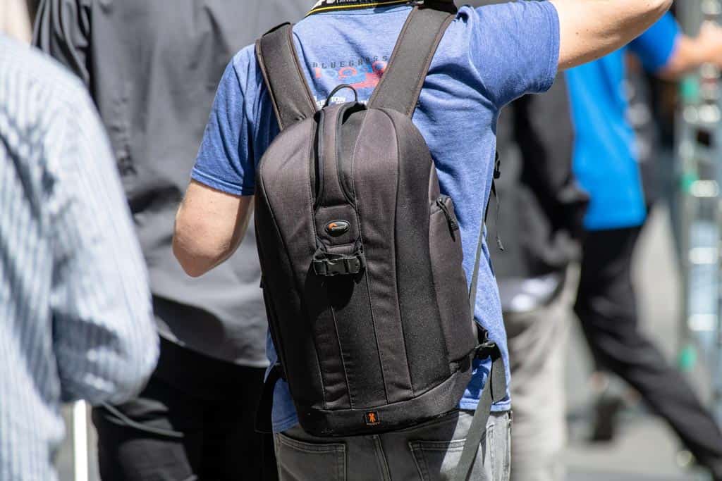 Man Wearing Camera Bag