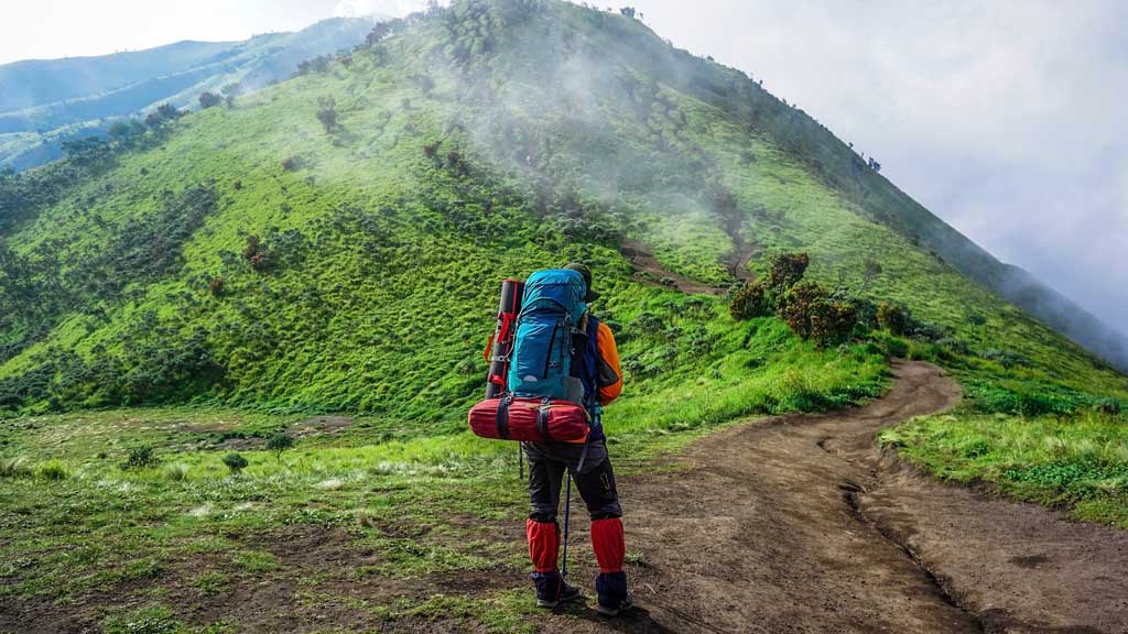 Man Hiking With Travel Backpack