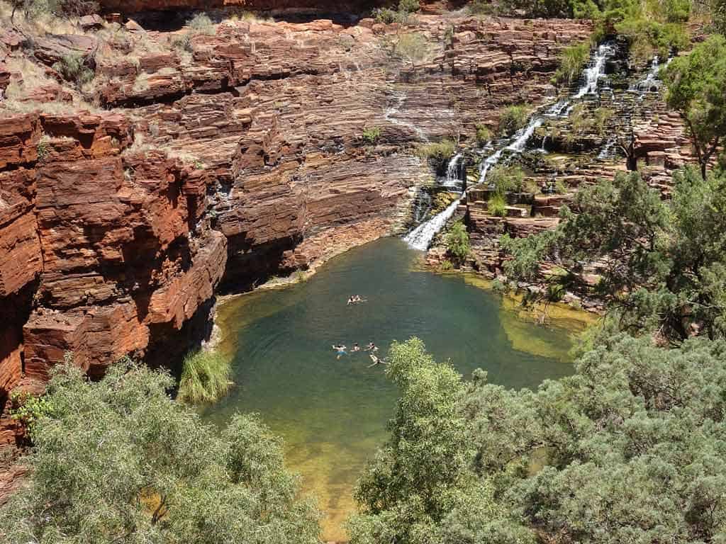 Natural Pool With People Swimming