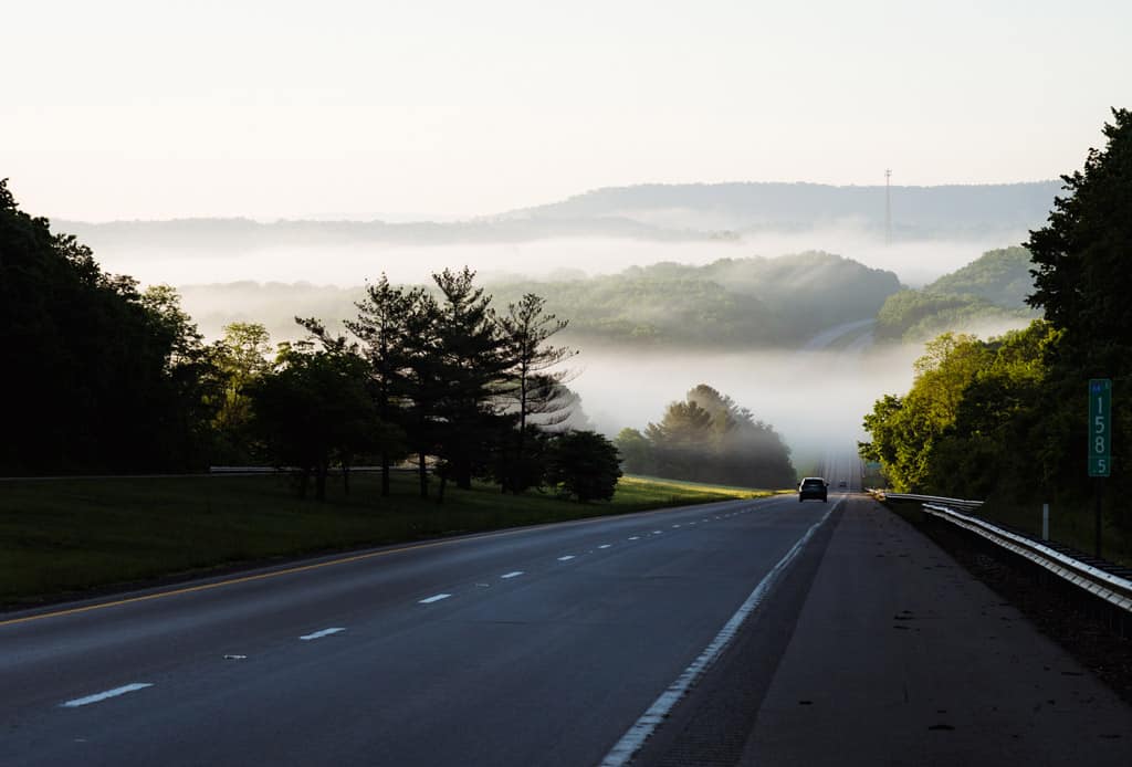 Car Driving Down Road