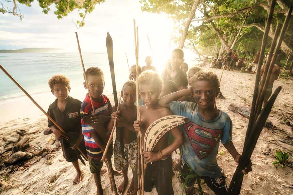 Young Warriors Pose With Spears At Sunrise Before The First Fight.