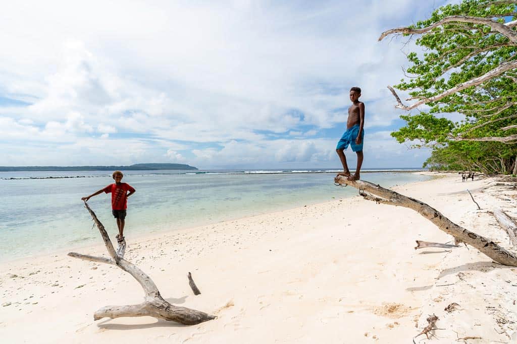 Two Boys Look Out Over The Sea On The Afternoon Before Wogasia.