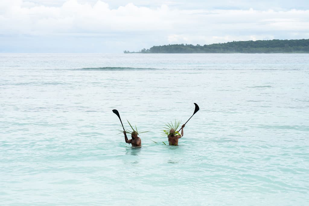 Mocking The Approaching Tribe From The Sea.