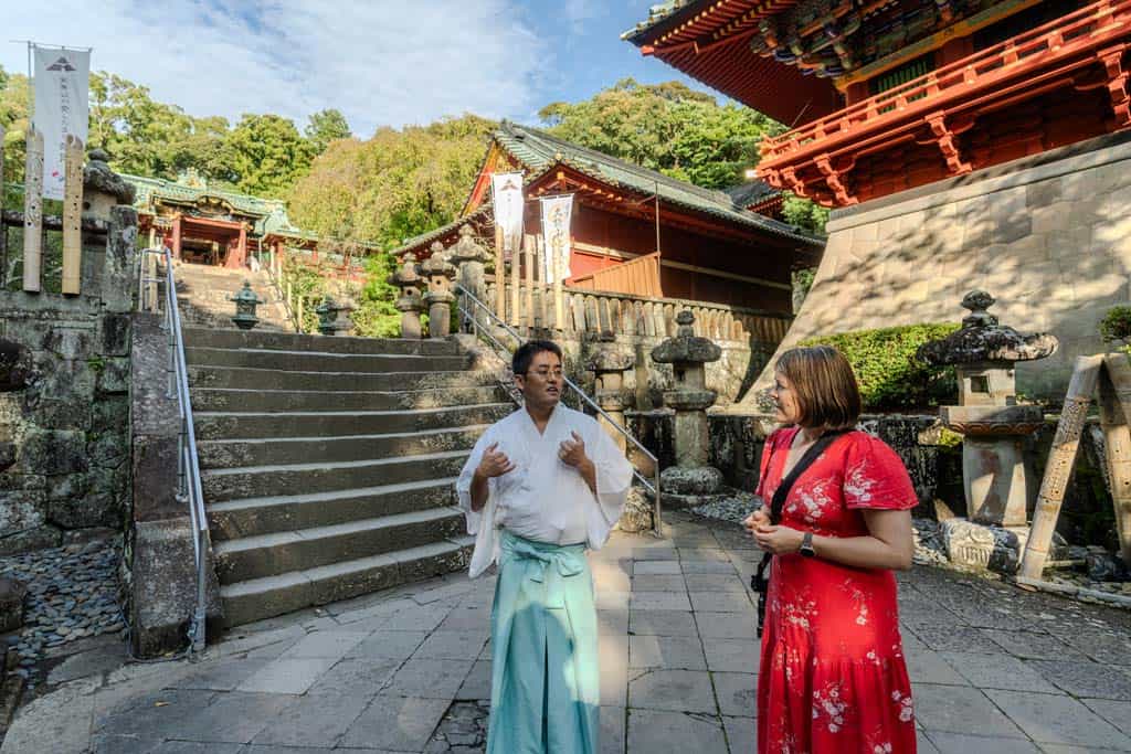 Alesha Chatting With One Of The Monks At Kunozan Toshogu Shrine.