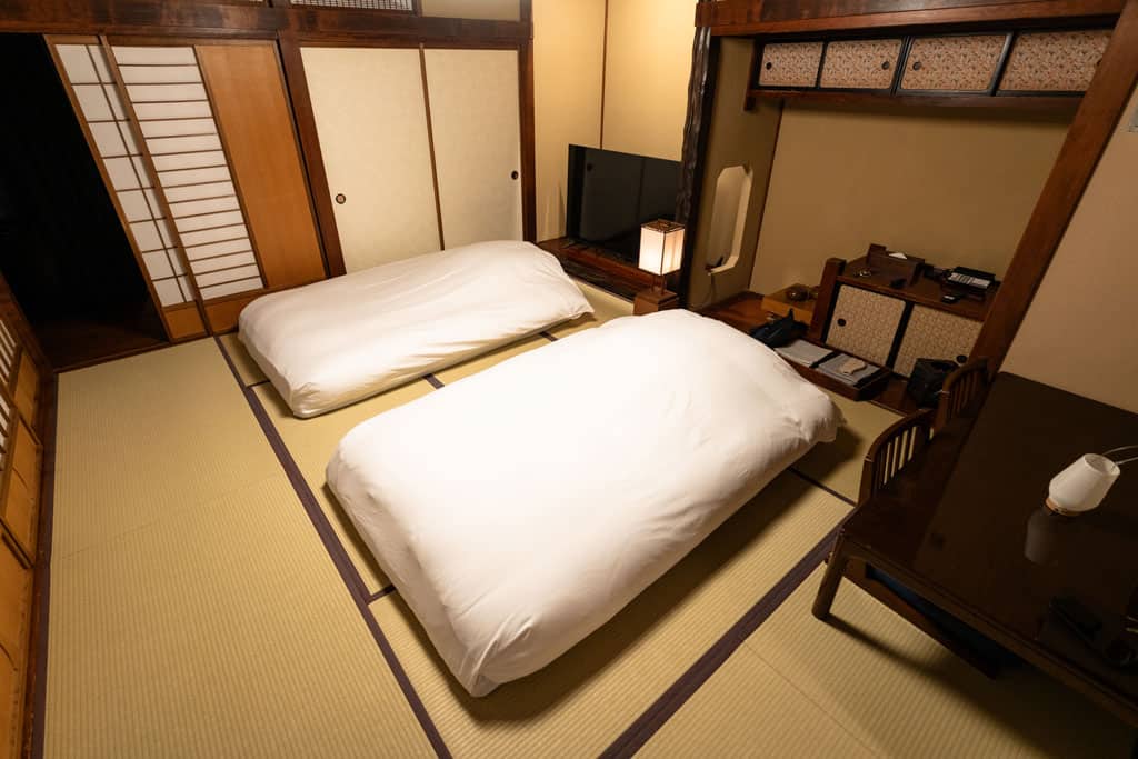 Ryokan Ochiairo Tsubaki Room Beds
