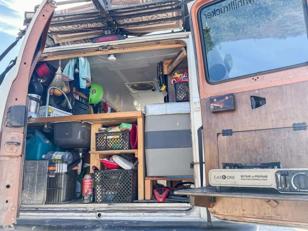 A Kitchen Built In The Back Of A Campervan