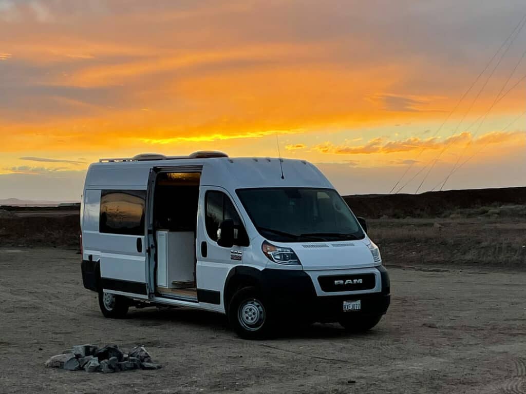 Dodge Promaster In Desert At Sunset