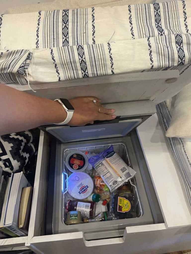 Dometic Chest Fridge Kept Under A Bench Seat In A Campervan