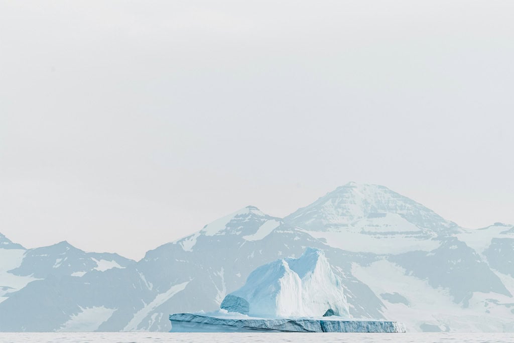 Arctic Icebergs And Mountains